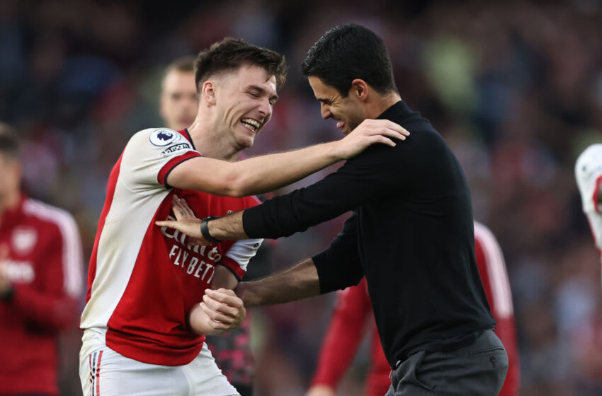 LONDON, ENGLAND - SEPTEMBER 26: Mikel Arteta manager of Arsenal and Kieran Tierney react after the Premier League match between Arsenal and Tottenham Hotspur at Emirates Stadium on September 26, 2021 in London, England. (Photo by Marc Atkins/Getty Images)