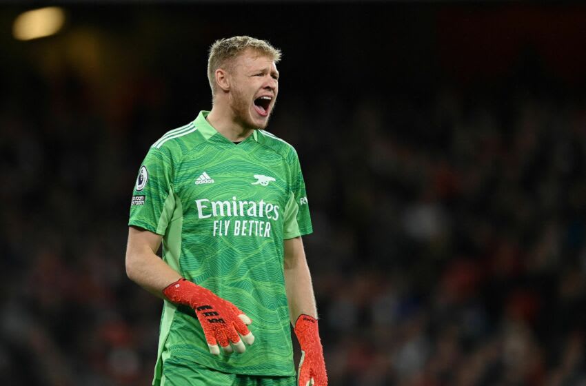 Arsenal's English goalkeeper Aaron Ramsdale shouts at his teammates during the English Premier League football match between Arsenal and Crystal Palace at the Emirates Stadium in London on October 18, 2021. - - RESTRICTED TO EDITORIAL USE. No use with unauthorized audio, video, data, fixture lists, club/league logos or 'live' services. Online in-match use limited to 120 images. An additional 40 images may be used in extra time. No video emulation. Social media in-match use limited to 120 images. An additional 40 images may be used in extra time. No use in betting publications, games or single club/league/player publications. (Photo by Glyn KIRK / AFP) / RESTRICTED TO EDITORIAL USE. No use with unauthorized audio, video, data, fixture lists, club/league logos or 'live' services. Online in-match use limited to 120 images. An additional 40 images may be used in extra time. No video emulation. Social media in-match use limited to 120 images. An additional 40 images may be used in extra time. No use in betting publications, games or single club/league/player publications. / RESTRICTED TO EDITORIAL USE. No use with unauthorized audio, video, data, fixture lists, club/league logos or 'live' services. Online in-match use limited to 120 images. An additional 40 images may be used in extra time. No video emulation. Social media in-match use limited to 120 images. An additional 40 images may be used in extra time. No use in betting publications, games or single club/league/player publications. (Photo by GLYN KIRK/AFP via Getty Images)