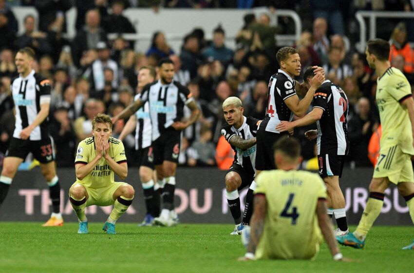 Arsenal's Norwegian midfielder Martin Odegaard (L) reacts after the English Premier League football match between Newcastle United and Arsenal at St James' Park in Newcastle-upon-Tyne, north east England on May 16, 2022. - Newcastle won the match 2-0. - RESTRICTED TO EDITORIAL USE. No use with unauthorized audio, video, data, fixture lists, club/league logos or 'live' services. Online in-match use limited to 120 images. An additional 40 images may be used in extra time. No video emulation. Social media in-match use limited to 120 images. An additional 40 images may be used in extra time. No use in betting publications, games or single club/league/player publications. (Photo by Oli SCARFF / AFP) / RESTRICTED TO EDITORIAL USE. No use with unauthorized audio, video, data, fixture lists, club/league logos or 'live' services. Online in-match use limited to 120 images. An additional 40 images may be used in extra time. No video emulation. Social media in-match use limited to 120 images. An additional 40 images may be used in extra time. No use in betting publications, games or single club/league/player publications. / RESTRICTED TO EDITORIAL USE. No use with unauthorized audio, video, data, fixture lists, club/league logos or 'live' services. Online in-match use limited to 120 images. An additional 40 images may be used in extra time. No video emulation. Social media in-match use limited to 120 images. An additional 40 images may be used in extra time. No use in betting publications, games or single club/league/player publications. (Photo by OLI SCARFF/AFP via Getty Images)