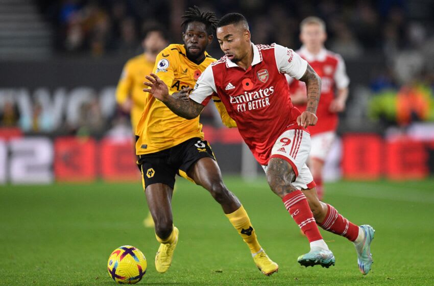 Wolverhampton Wanderers' Malian midfielder Boubacar Traore (L) vies with Arsenal's Brazilian striker Gabriel Jesus (R) during the English Premier League football match between Wolverhampton Wanderers and Arsenal at the Molineux stadium in Wolverhampton, central England on November 12, 2022. - RESTRICTED TO EDITORIAL USE. No use with unauthorized audio, video, data, fixture lists, club/league logos or 'live' services. Online in-match use limited to 120 images. An additional 40 images may be used in extra time. No video emulation. Social media in-match use limited to 120 images. An additional 40 images may be used in extra time. No use in betting publications, games or single club/league/player publications. (Photo by Oli SCARFF / AFP) / RESTRICTED TO EDITORIAL USE. No use with unauthorized audio, video, data, fixture lists, club/league logos or 'live' services. Online in-match use limited to 120 images. An additional 40 images may be used in extra time. No video emulation. Social media in-match use limited to 120 images. An additional 40 images may be used in extra time. No use in betting publications, games or single club/league/player publications. / RESTRICTED TO EDITORIAL USE. No use with unauthorized audio, video, data, fixture lists, club/league logos or 'live' services. Online in-match use limited to 120 images. An additional 40 images may be used in extra time. No video emulation. Social media in-match use limited to 120 images. An additional 40 images may be used in extra time. No use in betting publications, games or single club/league/player publications. (Photo by OLI SCARFF/AFP via Getty Images)