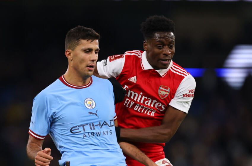 MANCHESTER, ENGLAND - JANUARY 27: Rodrigo of Manchester City in action with Albert Sambi Lokonga of Arsenal during the Emirates FA Cup Fourth Round match between Manchester City and Arsenal at Etihad Stadium on January 27, 2023 in Manchester, England. (Photo by Marc Atkins/Getty Images)