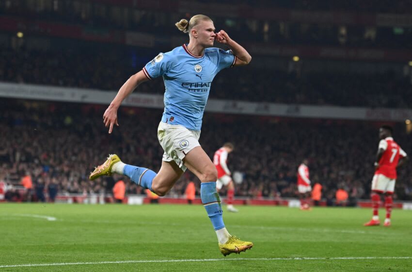 Manchester City's Norwegian striker Erling Haaland celebrates after scoring his team third goal during the English Premier League football match between Arsenal and Manchester City at the Emirates Stadium in London on February 15, 2023. - - RESTRICTED TO EDITORIAL USE. No use with unauthorized audio, video, data, fixture lists, club/league logos or 'live' services. Online in-match use limited to 120 images. An additional 40 images may be used in extra time. No video emulation. Social media in-match use limited to 120 images. An additional 40 images may be used in extra time. No use in betting publications, games or single club/league/player publications. (Photo by Glyn KIRK / AFP) / RESTRICTED TO EDITORIAL USE. No use with unauthorized audio, video, data, fixture lists, club/league logos or 'live' services. Online in-match use limited to 120 images. An additional 40 images may be used in extra time. No video emulation. Social media in-match use limited to 120 images. An additional 40 images may be used in extra time. No use in betting publications, games or single club/league/player publications. / RESTRICTED TO EDITORIAL USE. No use with unauthorized audio, video, data, fixture lists, club/league logos or 'live' services. Online in-match use limited to 120 images. An additional 40 images may be used in extra time. No video emulation. Social media in-match use limited to 120 images. An additional 40 images may be used in extra time. No use in betting publications, games or single club/league/player publications. (Photo by GLYN KIRK/AFP via Getty Images)