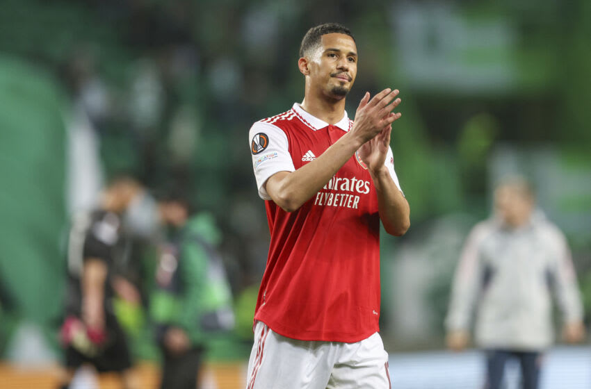 LISBON, PORTUGAL - MARCH 09: William Saliba of Arsenal FC thanks the supporters in the stands after the UEFA Europa League round of 16 leg one match between Sporting CP and Arsenal FC at Estadio Jose Alvalade on March 9, 2023 in Lisbon, Portugal. (Photo by Carlos Rodrigues/Getty Images)