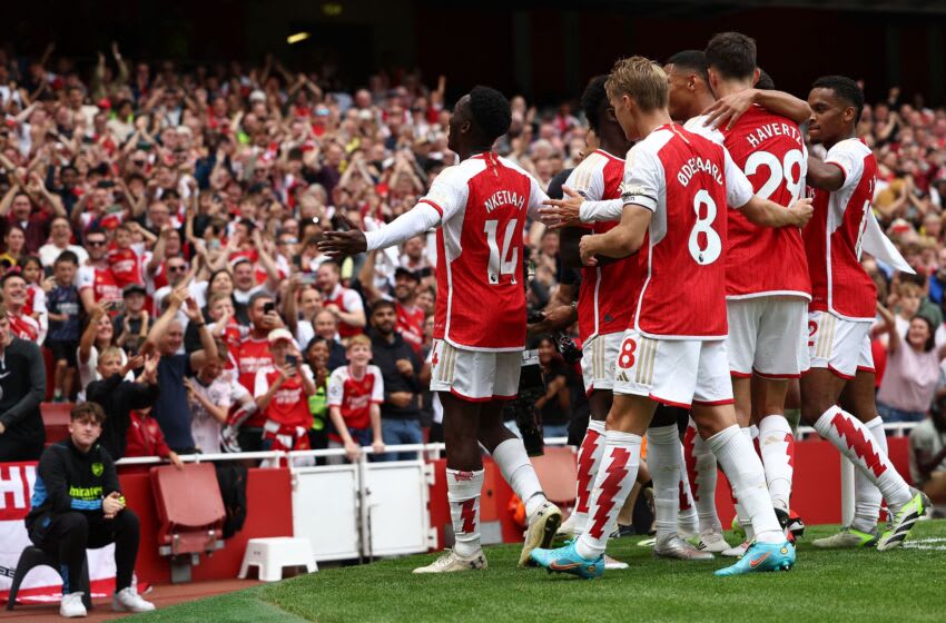 Arsenal's English striker #14 Eddie Nketiah (L) celebrates scoring the opening goal during the English Premier League football match between Arsenal and Nottingham Forest at the Emirates Stadium in London on August 12, 2023. (Photo by HENRY NICHOLLS / AFP) / RESTRICTED TO EDITORIAL USE. No use with unauthorized audio, video, data, fixture lists, club/league logos or 'live' services. Online in-match use limited to 120 images. An additional 40 images may be used in extra time. No video emulation. Social media in-match use limited to 120 images. An additional 40 images may be used in extra time. No use in betting publications, games or single club/league/player publications. / (Photo by HENRY NICHOLLS/AFP via Getty Images)