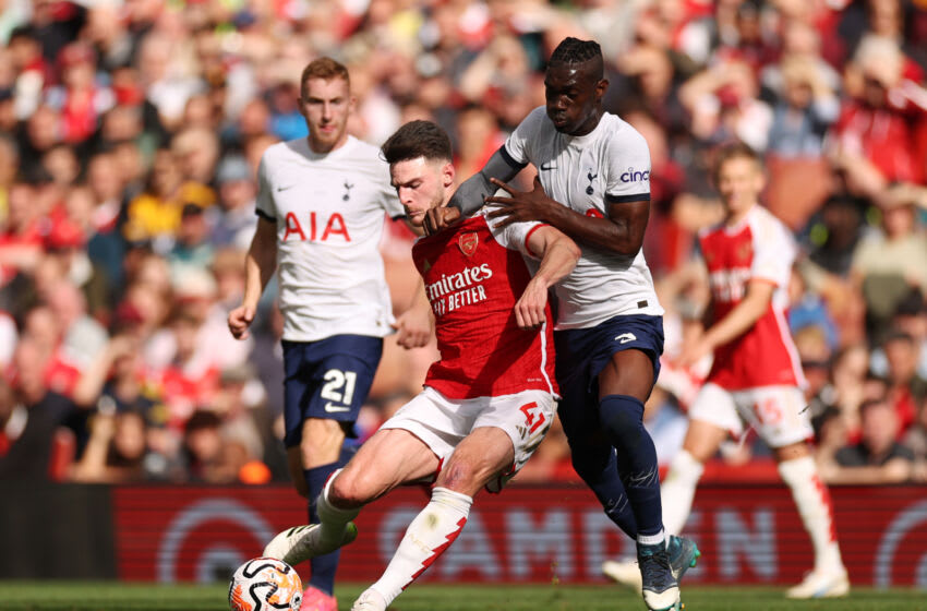 LONDON, ENGLAND - SEPTEMBER 24: Declan Rice of Arsenal is challenged by Yves Bissouma of Tottenham Hotspur during the Premier League match between Arsenal FC and Tottenham Hotspur at Emirates Stadium on September 24, 2023 in London, England. (Photo by Ryan Pierse/Getty Images)