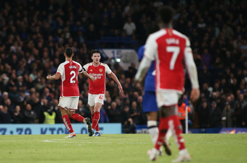 LONDON, ENGLAND - OCTOBER 21: Declan Rice of Arsenal celebrates with teammate William Saliba after scoring a goal 2-1 during the Premier League match between Chelsea FC and Arsenal FC at Stamford Bridge on October 21, 2023 in London, England. (Photo by MB Media/Getty Images)