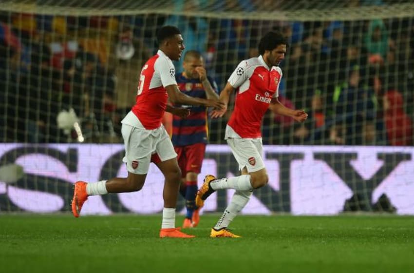 BARCELONA, SPAIN - MARCH 16: Mohamed Elneny of Arsenal celebrates scoring with Alex Iwobi of Arsenal during the UEFA Champions League Round of 16 Second Leg match between FC Barcelona and Arsenal FC at Camp Nou on March 16, 2016 in Barcelona,Spain. (Photo by Ian MacNicol/Getty Images)